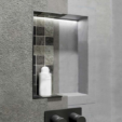 Marmox recessed shower wall niches installed in tiled bathroom waterproofing system